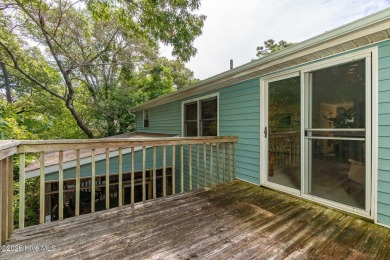Welcome to this beautifully maintained 4-bedroom, 2-bath coastal on The Country Club of the Crystal Coast in North Carolina - for sale on GolfHomes.com, golf home, golf lot