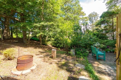 Welcome to this beautifully maintained 4-bedroom, 2-bath coastal on The Country Club of the Crystal Coast in North Carolina - for sale on GolfHomes.com, golf home, golf lot