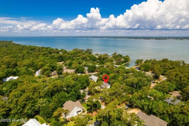 Welcome to this beautifully maintained 4-bedroom, 2-bath coastal on The Country Club of the Crystal Coast in North Carolina - for sale on GolfHomes.com, golf home, golf lot