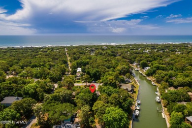 Welcome to this beautifully maintained 4-bedroom, 2-bath coastal on The Country Club of the Crystal Coast in North Carolina - for sale on GolfHomes.com, golf home, golf lot