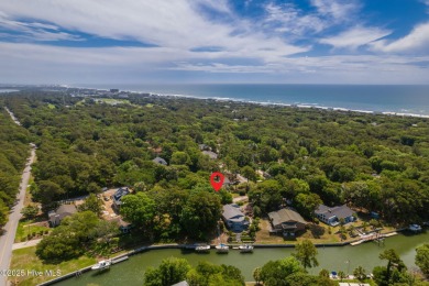 Welcome to this beautifully maintained 4-bedroom, 2-bath coastal on The Country Club of the Crystal Coast in North Carolina - for sale on GolfHomes.com, golf home, golf lot