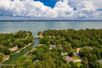 Welcome to this beautifully maintained 4-bedroom, 2-bath coastal on The Country Club of the Crystal Coast in North Carolina - for sale on GolfHomes.com, golf home, golf lot