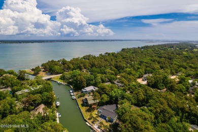 Welcome to this beautifully maintained 4-bedroom, 2-bath coastal on The Country Club of the Crystal Coast in North Carolina - for sale on GolfHomes.com, golf home, golf lot