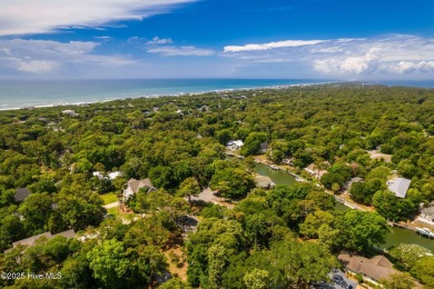 Welcome to this beautifully maintained 4-bedroom, 2-bath coastal on The Country Club of the Crystal Coast in North Carolina - for sale on GolfHomes.com, golf home, golf lot