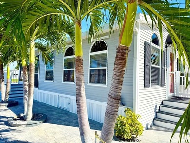 This is a home that has it all! There is no need for a list of on The Rookery At Marco in Florida - for sale on GolfHomes.com, golf home, golf lot