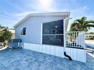 This is a home that has it all! There is no need for a list of on The Rookery At Marco in Florida - for sale on GolfHomes.com, golf home, golf lot