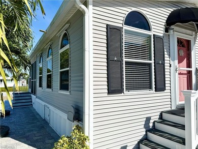 This is a home that has it all! There is no need for a list of on The Rookery At Marco in Florida - for sale on GolfHomes.com, golf home, golf lot