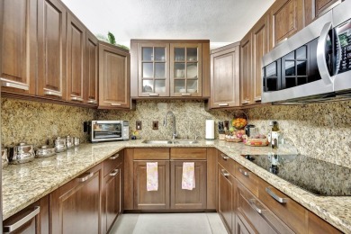 Exquisite 3-bed, 2-bath condo in sought-after Pine Ridge at on Monarch Country Club in Florida - for sale on GolfHomes.com, golf home, golf lot