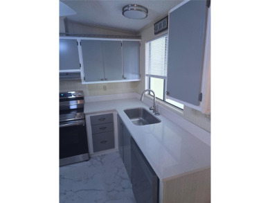Welcome to this COMPLETELY UPDATED home in Orange Blossom, The on Stonecrest Golf and Club Club in Florida - for sale on GolfHomes.com, golf home, golf lot