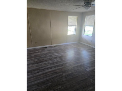 Welcome to this COMPLETELY UPDATED home in Orange Blossom, The on Stonecrest Golf and Club Club in Florida - for sale on GolfHomes.com, golf home, golf lot
