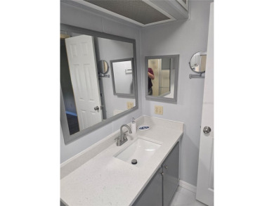Welcome to this COMPLETELY UPDATED home in Orange Blossom, The on Stonecrest Golf and Club Club in Florida - for sale on GolfHomes.com, golf home, golf lot