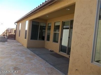 Cute Heather plan with a Spanish flair. This 2 bedroom, 1 and 3 on StoneRidge Golf Course in Arizona - for sale on GolfHomes.com, golf home, golf lot