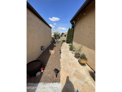 Cute Heather plan with a Spanish flair. This 2 bedroom, 1 and 3 on StoneRidge Golf Course in Arizona - for sale on GolfHomes.com, golf home, golf lot