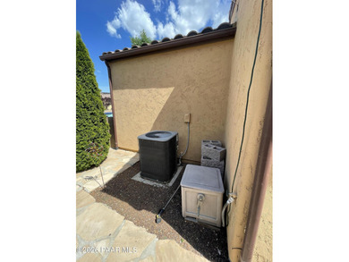 Cute Heather plan with a Spanish flair. This 2 bedroom, 1 and 3 on StoneRidge Golf Course in Arizona - for sale on GolfHomes.com, golf home, golf lot
