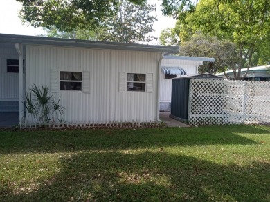 Large two bedroom two bathroom home, located in Rolling Green on Rolling Greens Executive Golf Community in Florida - for sale on GolfHomes.com, golf home, golf lot