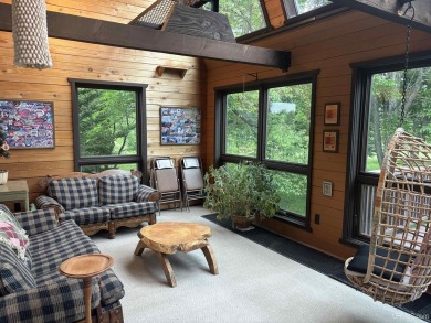 High-Efficiency Solar Home with Golf Course Frontage on 13+/- on Gogebic Country Club in Michigan - for sale on GolfHomes.com, golf home, golf lot