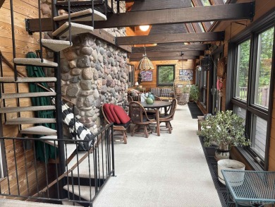 High-Efficiency Solar Home with Golf Course Frontage on 13+/- on Gogebic Country Club in Michigan - for sale on GolfHomes.com, golf home, golf lot