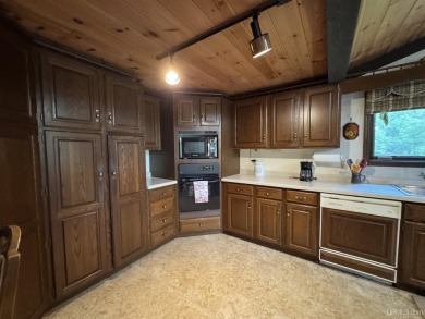 High-Efficiency Solar Home with Golf Course Frontage on 13+/- on Gogebic Country Club in Michigan - for sale on GolfHomes.com, golf home, golf lot