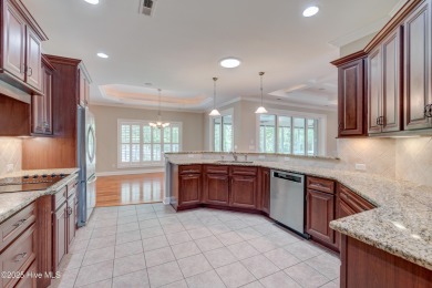 Welcome to 3012 Cobden Court, nestled on a quiet cul-de-sac in on Cape Fear National At Brunswick Forest in North Carolina - for sale on GolfHomes.com, golf home, golf lot