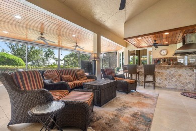 Tucked away on a quiet cul-de-sac in one of Palm Beach Gardens' on BallenIsles Golf and Country Club in Florida - for sale on GolfHomes.com, golf home, golf lot