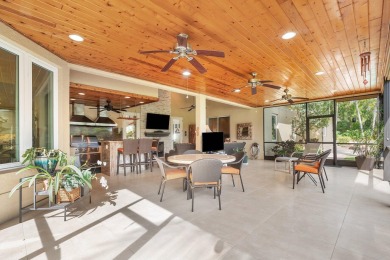 Tucked away on a quiet cul-de-sac in one of Palm Beach Gardens' on BallenIsles Golf and Country Club in Florida - for sale on GolfHomes.com, golf home, golf lot