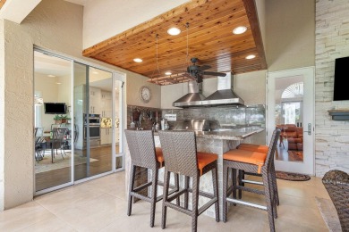 Tucked away on a quiet cul-de-sac in one of Palm Beach Gardens' on BallenIsles Golf and Country Club in Florida - for sale on GolfHomes.com, golf home, golf lot