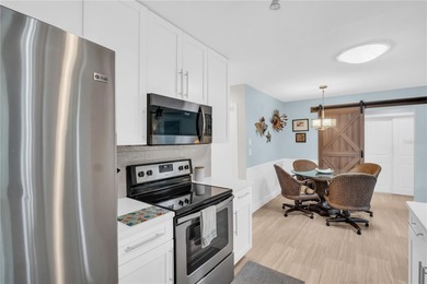 Everything in this single-family home has been done for you! on Highland Lakes Executive Golf Course in Florida - for sale on GolfHomes.com, golf home, golf lot