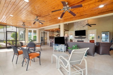 Tucked away on a quiet cul-de-sac in one of Palm Beach Gardens' on BallenIsles Golf and Country Club in Florida - for sale on GolfHomes.com, golf home, golf lot