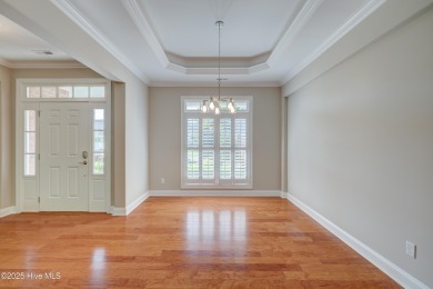 Welcome to 3012 Cobden Court, nestled on a quiet cul-de-sac in on Cape Fear National At Brunswick Forest in North Carolina - for sale on GolfHomes.com, golf home, golf lot