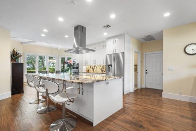 Tucked away on a quiet cul-de-sac in one of Palm Beach Gardens' on BallenIsles Golf and Country Club in Florida - for sale on GolfHomes.com, golf home, golf lot