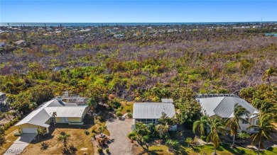 An idyllic setting in Sanibel's highly regarded Dunes Golf & on The Dunes Golf and Tennis Club in Florida - for sale on GolfHomes.com, golf home, golf lot