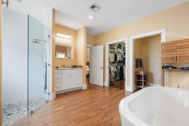 Tucked away on a quiet cul-de-sac in one of Palm Beach Gardens' on BallenIsles Golf and Country Club in Florida - for sale on GolfHomes.com, golf home, golf lot