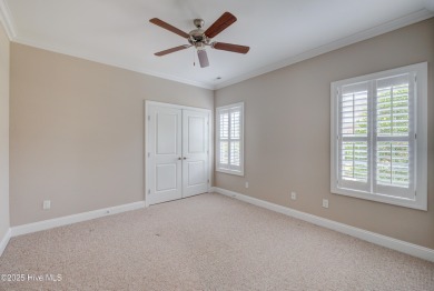 Welcome to 3012 Cobden Court, nestled on a quiet cul-de-sac in on Cape Fear National At Brunswick Forest in North Carolina - for sale on GolfHomes.com, golf home, golf lot