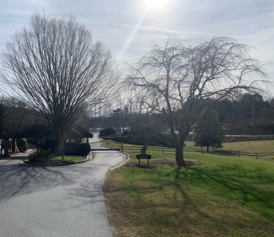 GENTLE LOT IN GATED GOLF COURSE COMMUNITY IN THE MOUNTAINS OF on Mountain Harbour Golf Club in North Carolina - for sale on GolfHomes.com, golf home, golf lot