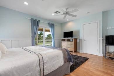 Tucked away on a quiet cul-de-sac in one of Palm Beach Gardens' on BallenIsles Golf and Country Club in Florida - for sale on GolfHomes.com, golf home, golf lot