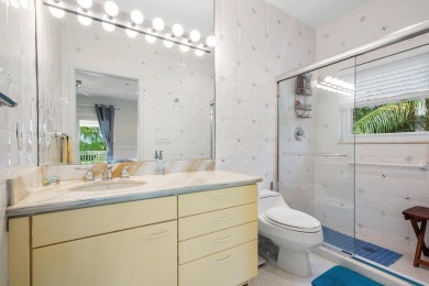 Tucked away on a quiet cul-de-sac in one of Palm Beach Gardens' on BallenIsles Golf and Country Club in Florida - for sale on GolfHomes.com, golf home, golf lot