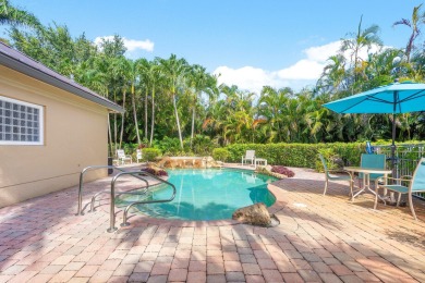Tucked away on a quiet cul-de-sac in one of Palm Beach Gardens' on BallenIsles Golf and Country Club in Florida - for sale on GolfHomes.com, golf home, golf lot