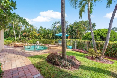 Tucked away on a quiet cul-de-sac in one of Palm Beach Gardens' on BallenIsles Golf and Country Club in Florida - for sale on GolfHomes.com, golf home, golf lot