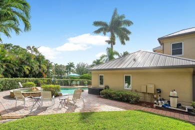 Tucked away on a quiet cul-de-sac in one of Palm Beach Gardens' on BallenIsles Golf and Country Club in Florida - for sale on GolfHomes.com, golf home, golf lot