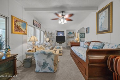 Welcome to your dream retreat in the serene community of Topsail on Topsail Green Golf Club in North Carolina - for sale on GolfHomes.com, golf home, golf lot