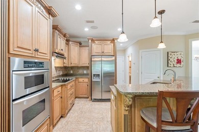 Meticulously maintained and truly move-in ready, this beautiful on Oak Grove Island Golf and Country Club in Georgia - for sale on GolfHomes.com, golf home, golf lot