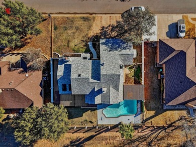 Uniquely contemporary tri-level home offering 5 bedrooms, 4.5 on Green Tree Country Club in Texas - for sale on GolfHomes.com, golf home, golf lot