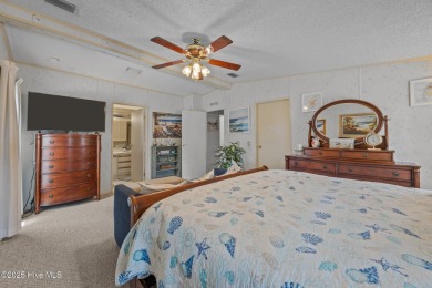 Welcome to your dream retreat in the serene community of Topsail on Topsail Green Golf Club in North Carolina - for sale on GolfHomes.com, golf home, golf lot