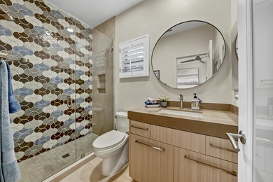 Experience modern luxury and sophisticated design in this fully on Rancho Mirage Country Club in California - for sale on GolfHomes.com, golf home, golf lot