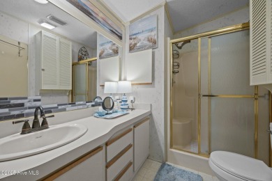 Welcome to your dream retreat in the serene community of Topsail on Topsail Green Golf Club in North Carolina - for sale on GolfHomes.com, golf home, golf lot