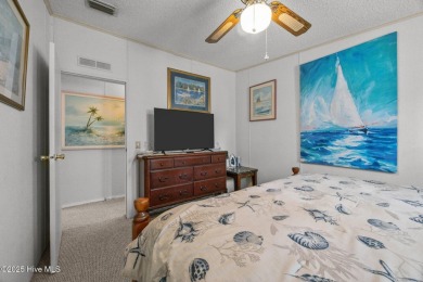 Welcome to your dream retreat in the serene community of Topsail on Topsail Green Golf Club in North Carolina - for sale on GolfHomes.com, golf home, golf lot