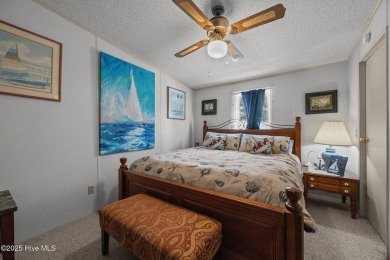 Welcome to your dream retreat in the serene community of Topsail on Topsail Green Golf Club in North Carolina - for sale on GolfHomes.com, golf home, golf lot