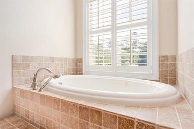 Meticulously maintained and truly move-in ready, this beautiful on Oak Grove Island Golf and Country Club in Georgia - for sale on GolfHomes.com, golf home, golf lot