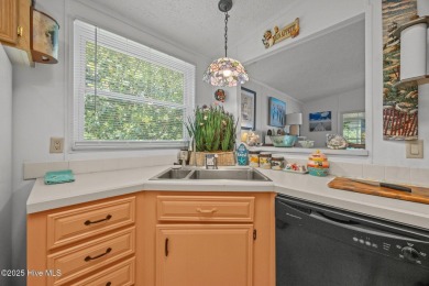 Welcome to your dream retreat in the serene community of Topsail on Topsail Green Golf Club in North Carolina - for sale on GolfHomes.com, golf home, golf lot