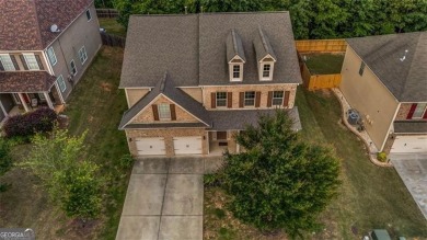 Welcome to your dream home in a sought-after golf course on Canongate At Heron Bay in Georgia - for sale on GolfHomes.com, golf home, golf lot